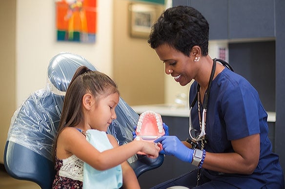 NATIVE HEALTH dental care team with a patient